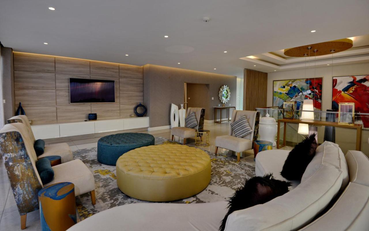 The Houghton Hotel, Spa, Wellness & Golf Johannesbourg Extérieur photo A living room in a luxury apartment