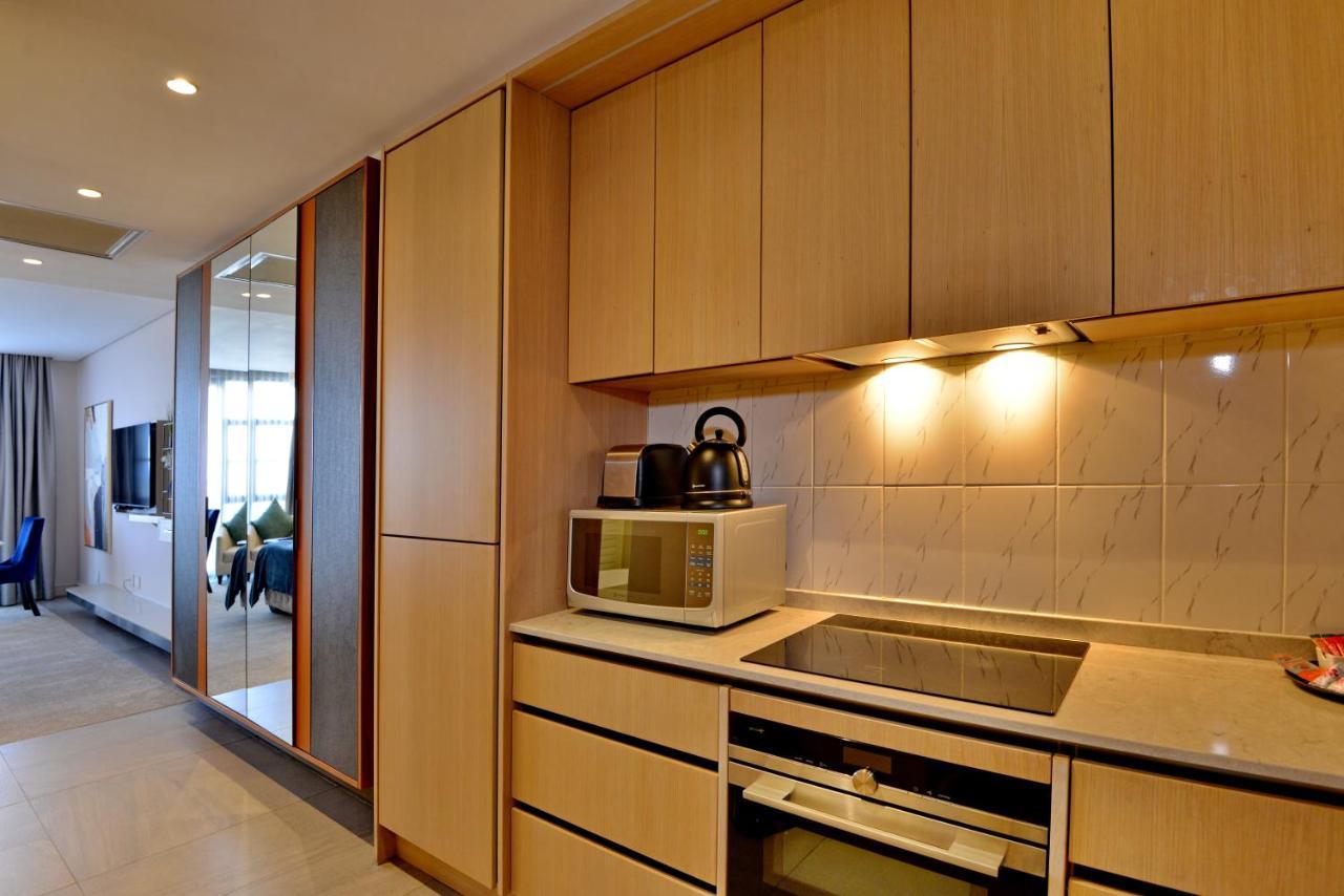 The Houghton Hotel, Spa, Wellness & Golf Johannesbourg Extérieur photo A kitchen in a serviced apartment