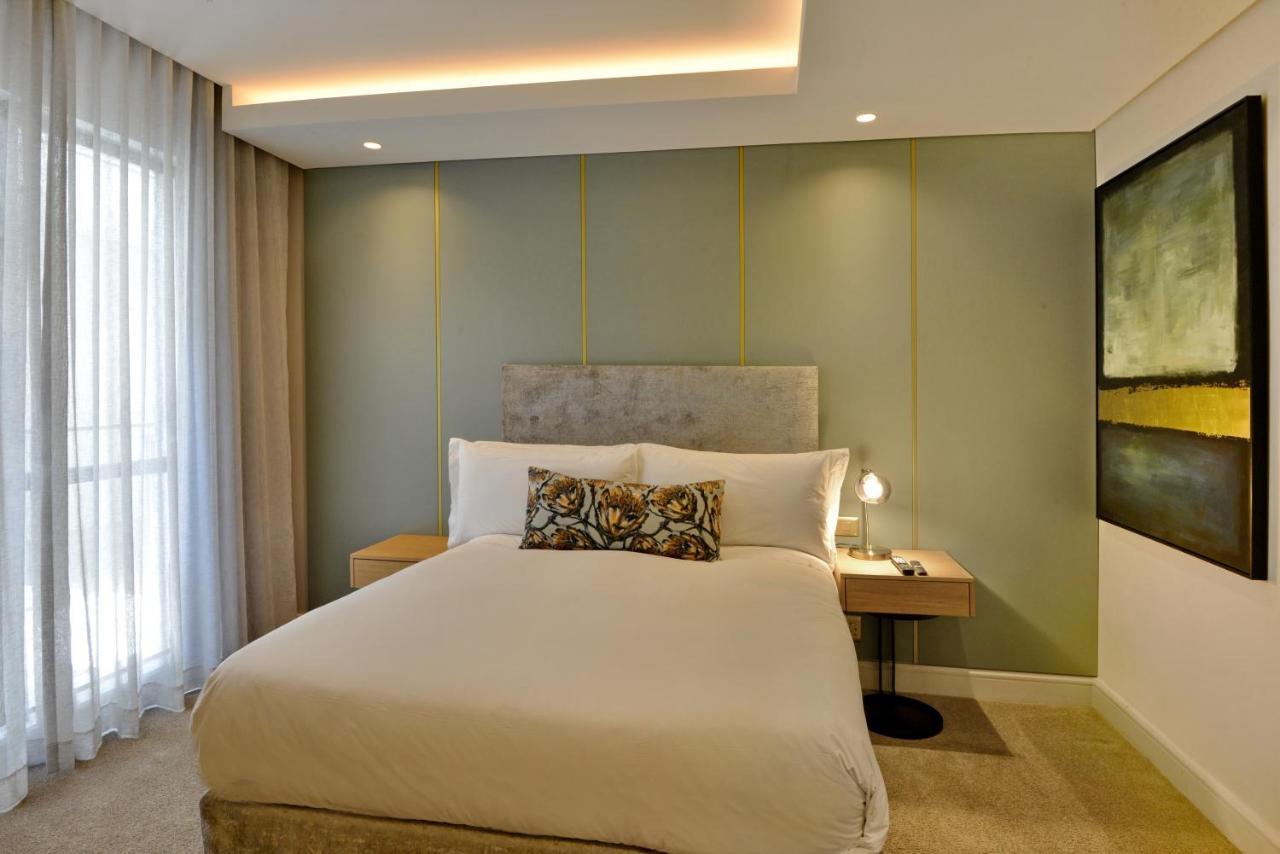 The Houghton Hotel, Spa, Wellness & Golf Johannesbourg Extérieur photo A bedroom at the hotel