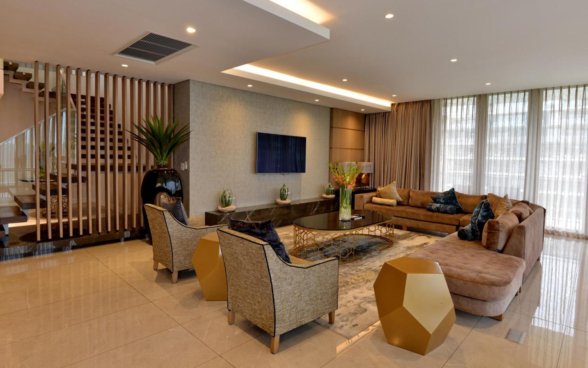 The Houghton Hotel, Spa, Wellness & Golf Johannesbourg Extérieur photo A living room in a luxury apartment