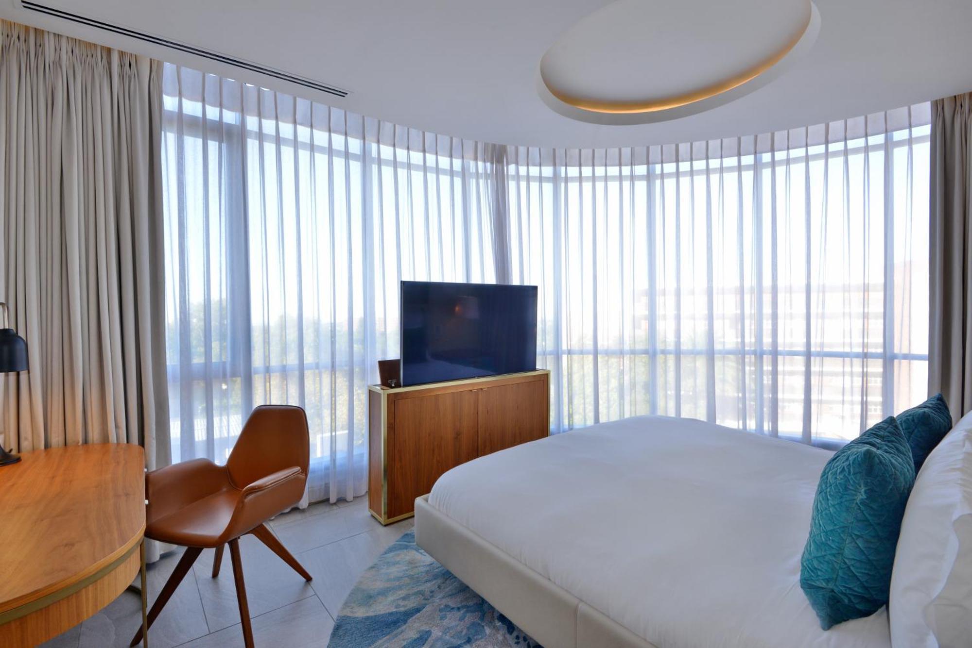 The Houghton Hotel, Spa, Wellness & Golf Johannesbourg Chambre photo A bedroom at the hotel