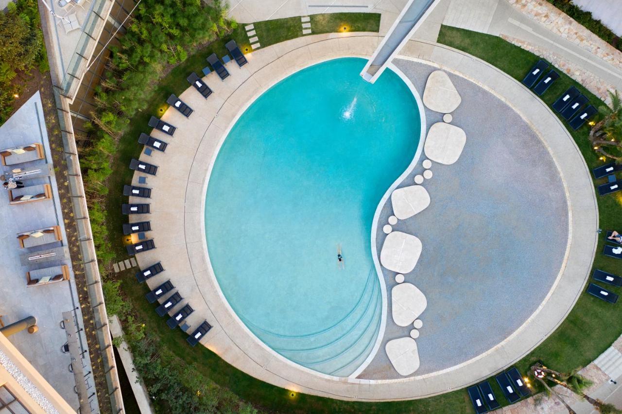 The Houghton Hotel, Spa, Wellness & Golf Johannesbourg Extérieur photo Aerial view of the pool at the hotel
